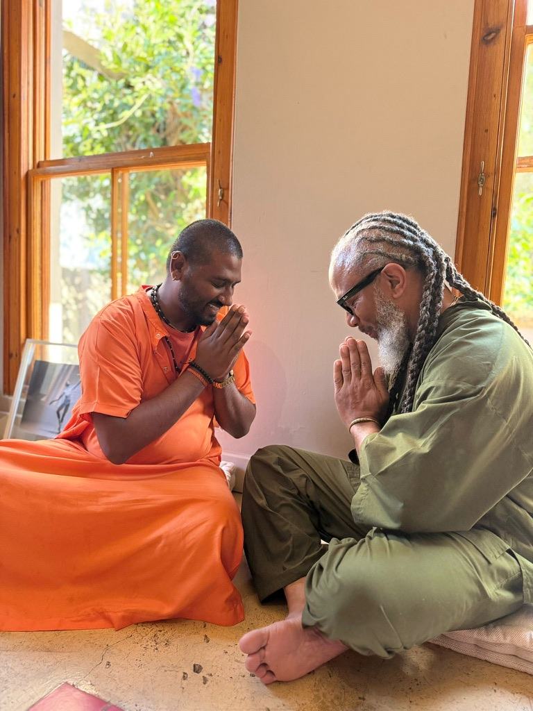 Heru TchaasAmen offering a Qi blessing in Johannesburg, South Africa