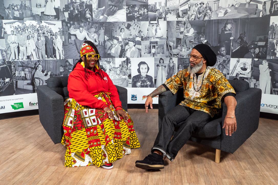 Heru TchaasAmen in a seated conversation on The Day with Trae Show