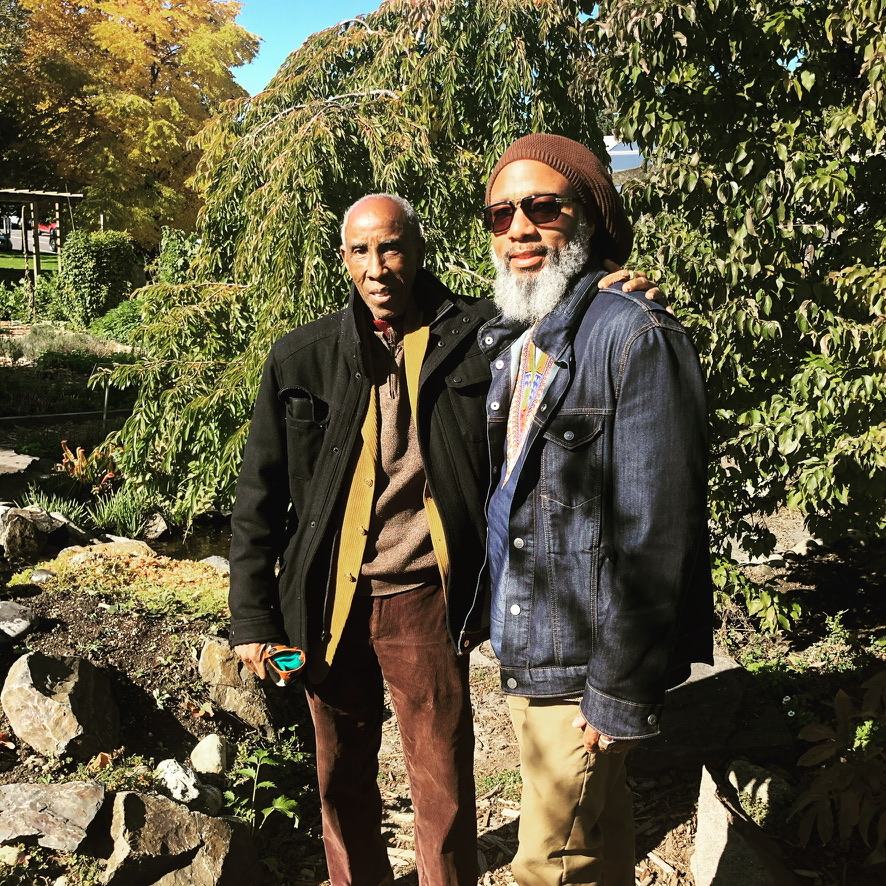 Heru TchaasAmen standing with Ra Un Nefer Amen I in a garden