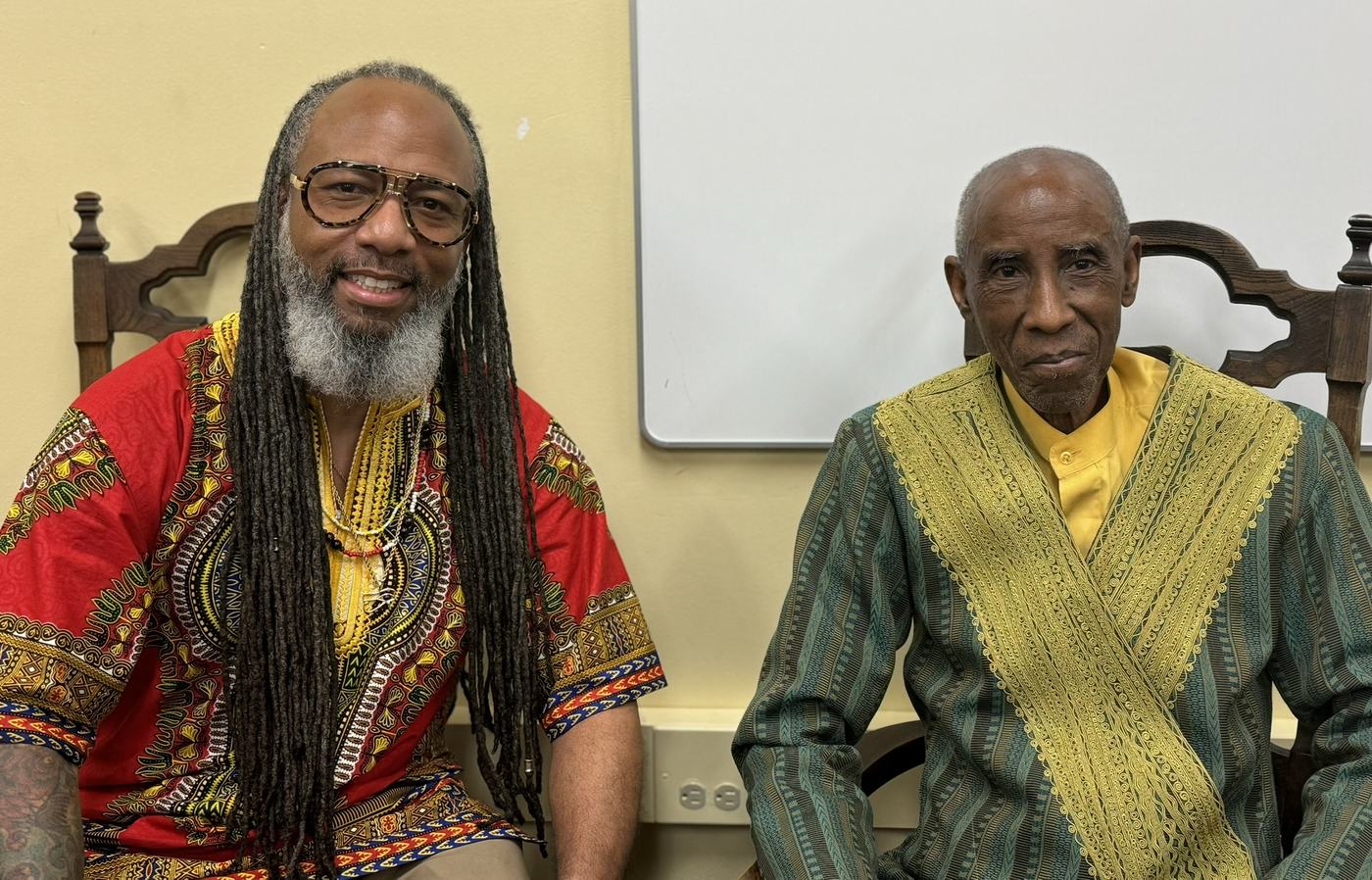 Heru TchaasAmen seated beside Ra Un Nefer Amen I